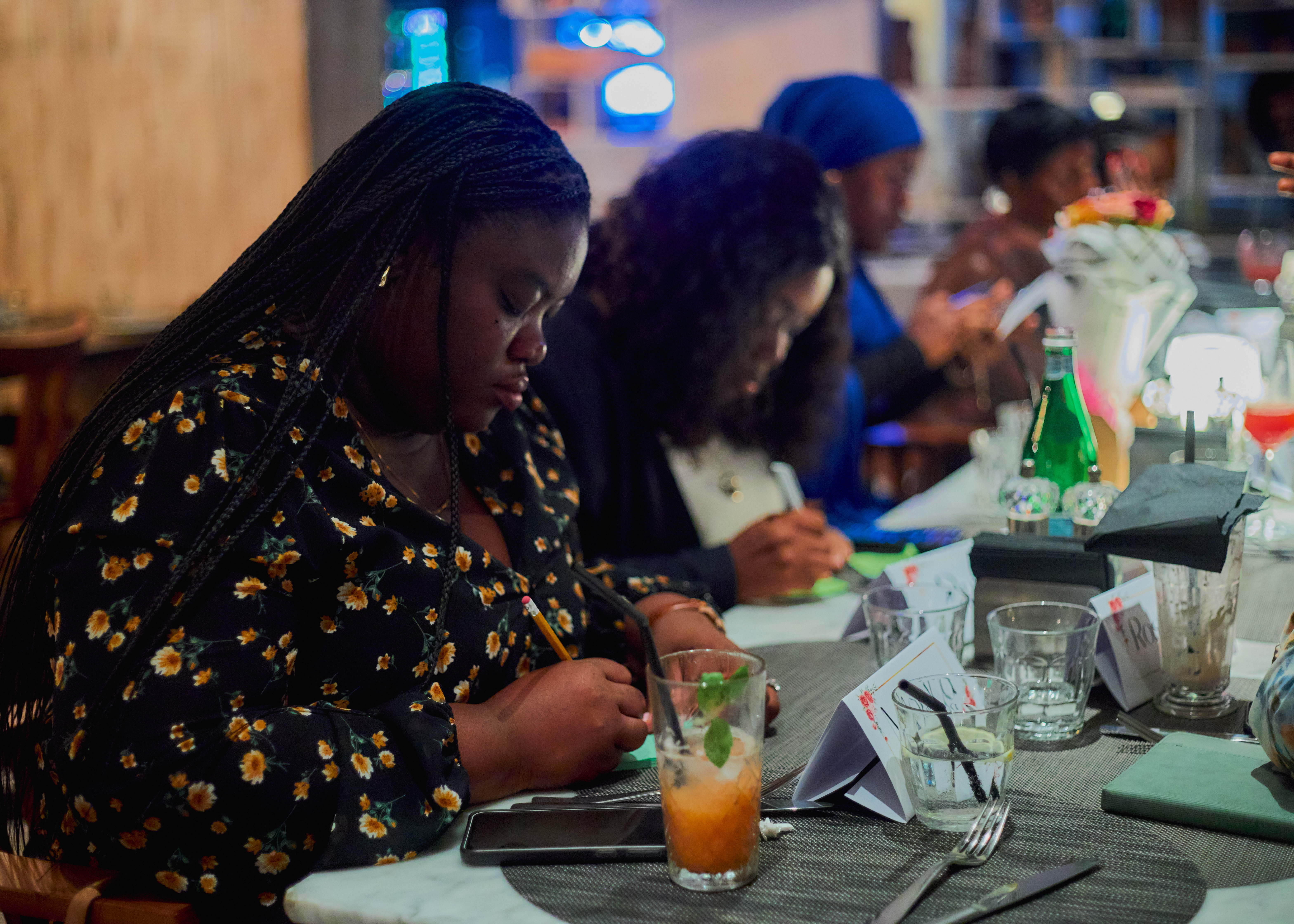 A table attendee reflecting and writing during the first Ambition Table